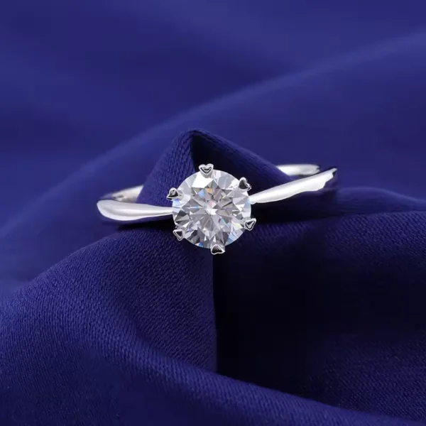 925 silver moissanite solitaire ring, blue fabric view