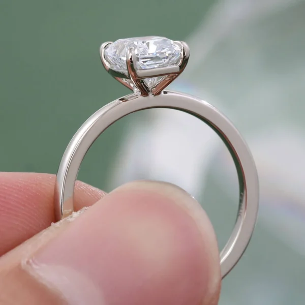 Additional product photograph showing the ring design, setting and band.