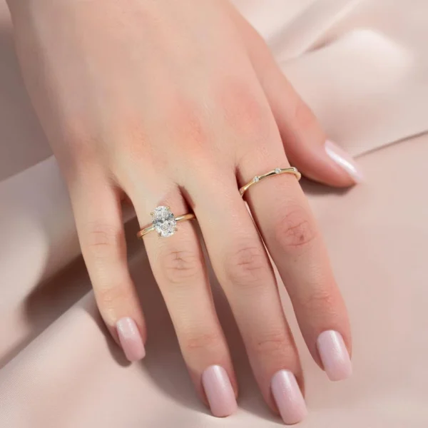 Additional product photograph showing the ring design, setting and band.