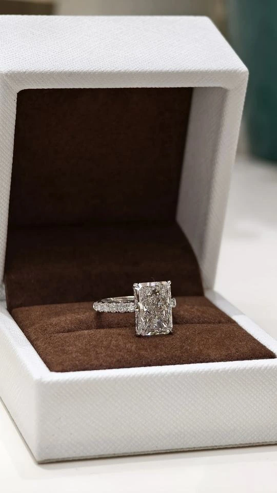 Additional product photograph showing the ring design, setting and band.
