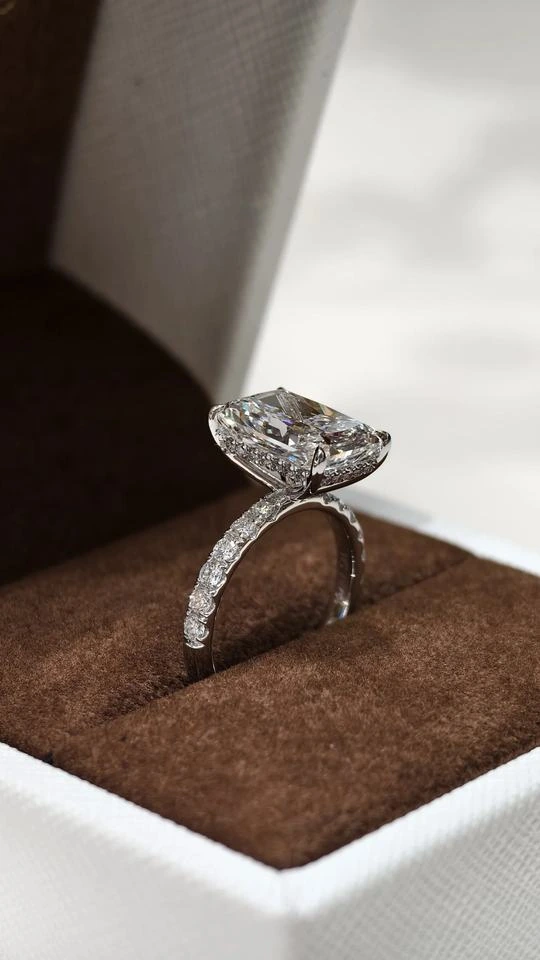 Additional product photograph showing the ring design, setting and band.