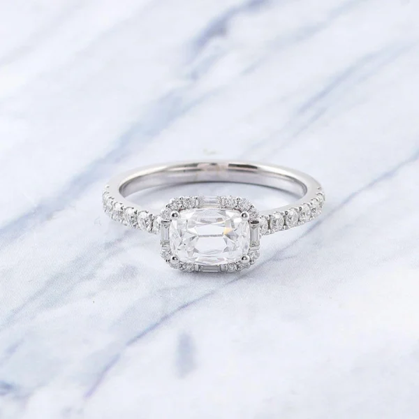 Additional product photograph showing the ring design, setting and band.