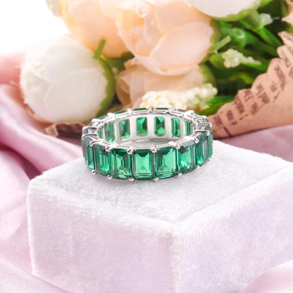 Additional product photograph showing the ring design, setting and band.