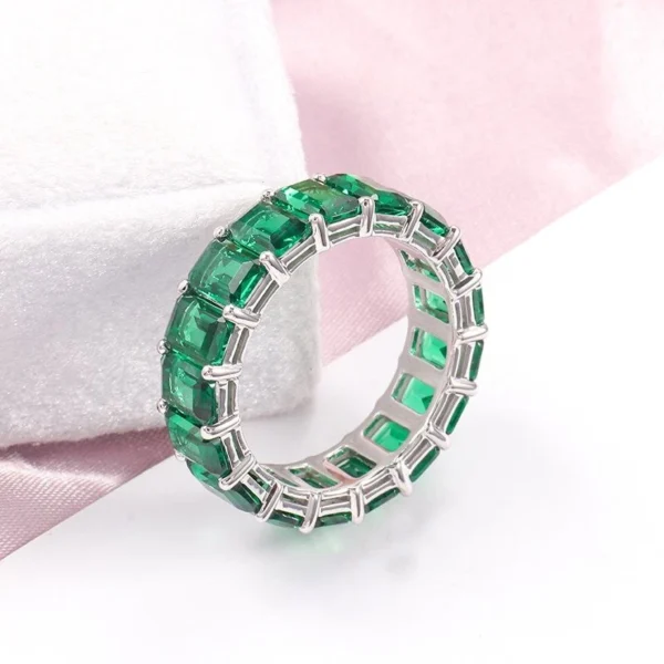Additional product photograph showing the ring design, setting and band.