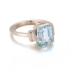 Emerald Gemstone Three-Stone Ring in 14K Solid Gold shown in the product photograph.
