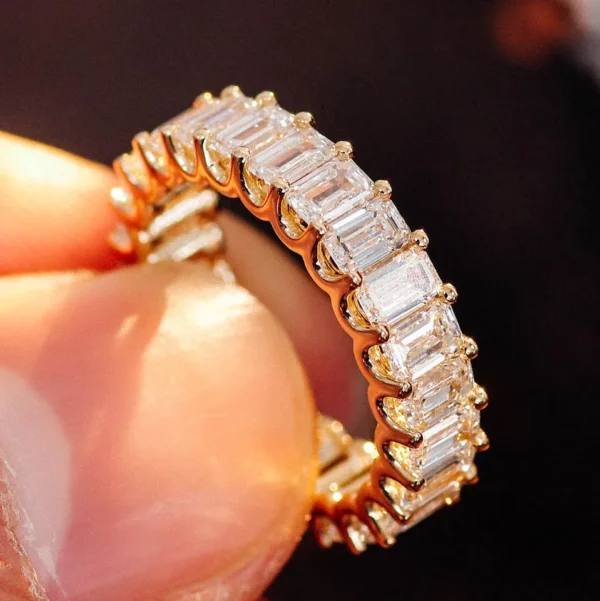 Additional product photograph showing the ring design, setting and band.