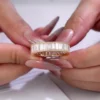 Additional product photograph showing the ring design, setting and band.