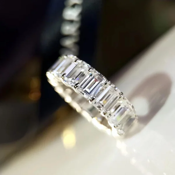 Additional product photograph showing the ring design, setting and band.