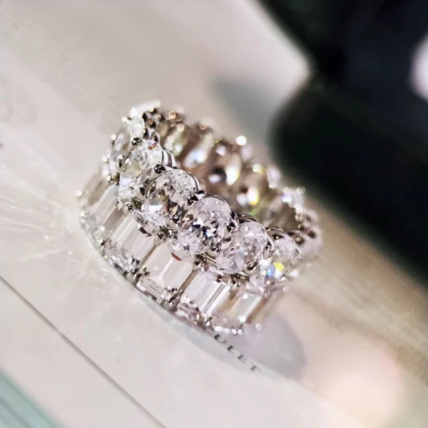 Additional product photograph showing the ring design, setting and band.