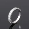 Emerald Moissanite Eternity Ring in Gold shown in the product photograph.
