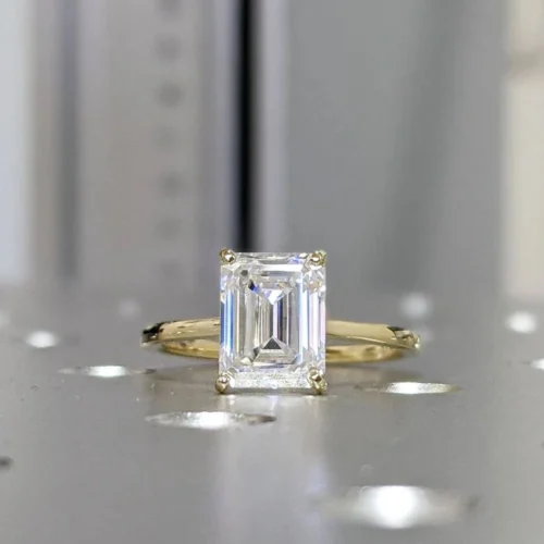 Emerald Moissanite Ring in Gold shown in the product photograph.