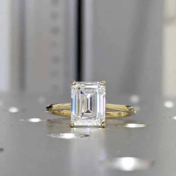 Emerald Moissanite Ring in Gold shown in the product photograph.