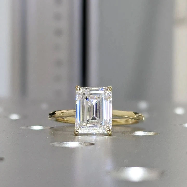 Emerald Moissanite Ring in Gold shown in the product photograph.