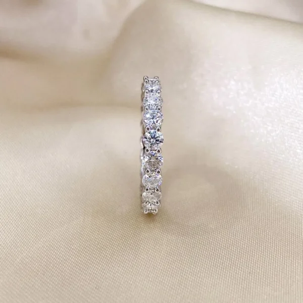 Additional product photograph showing the ring design, setting and band.