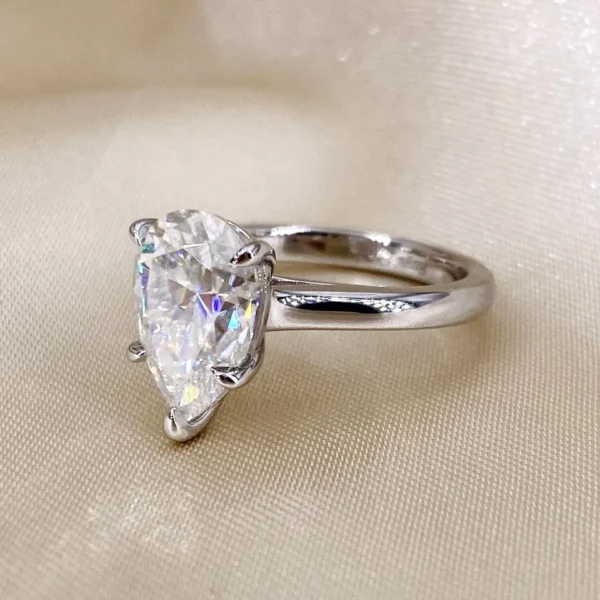 Additional product photograph showing the ring design, setting and band.