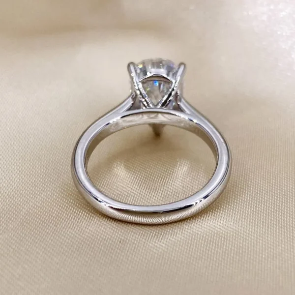 Additional product photograph showing the ring design, setting and band.