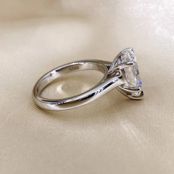 Additional product photograph showing the ring design, setting and band.