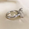 Additional product photograph showing the ring design, setting and band.