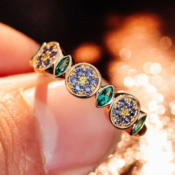 Additional product photograph showing the ring design, setting and band.
