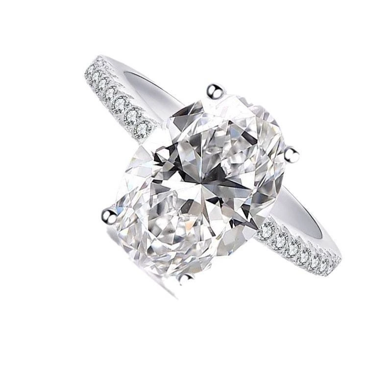 Product photograph showing the oval solitaire ring.