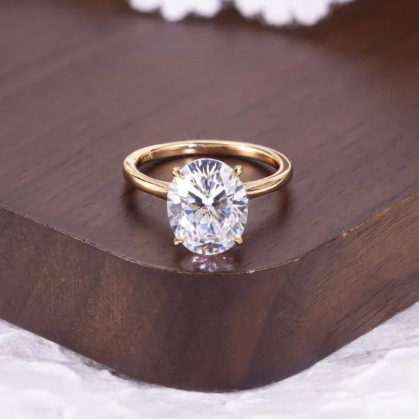 Product photograph showing the oval solitaire ring.