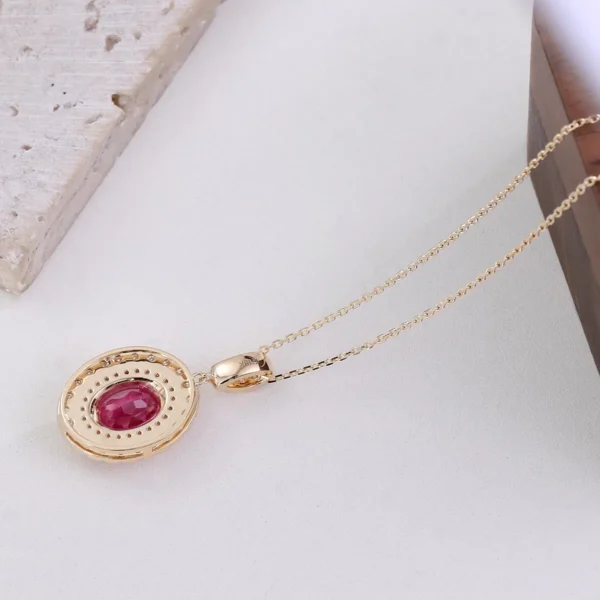 Oval pink stone halo pendant rear view showing the back of the setting