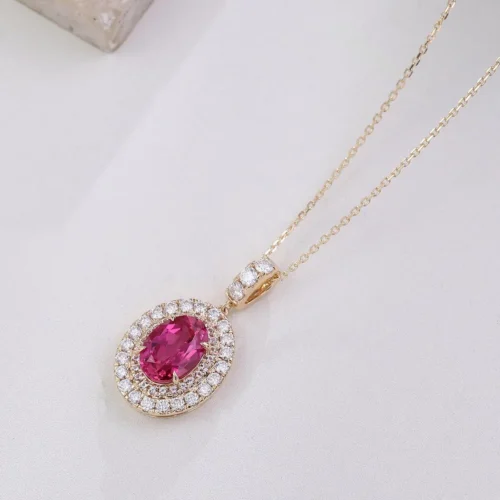 ggjwl-oval-pink-stone-halo-pendant-pd0001-main Oval pink stone halo pendant with clear accents, a decorated bail and a yellow setting color