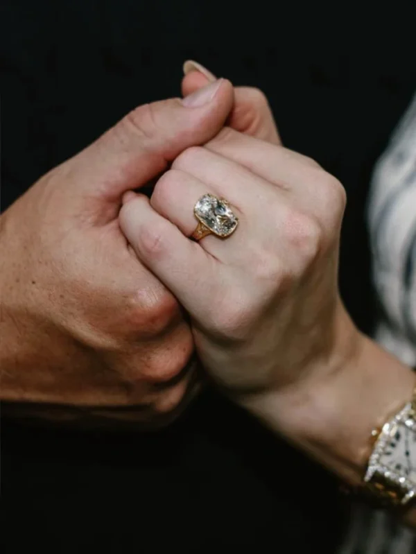 Additional product photograph showing the ring design, setting and band.