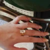 Additional product photograph showing the ring design, setting and band.