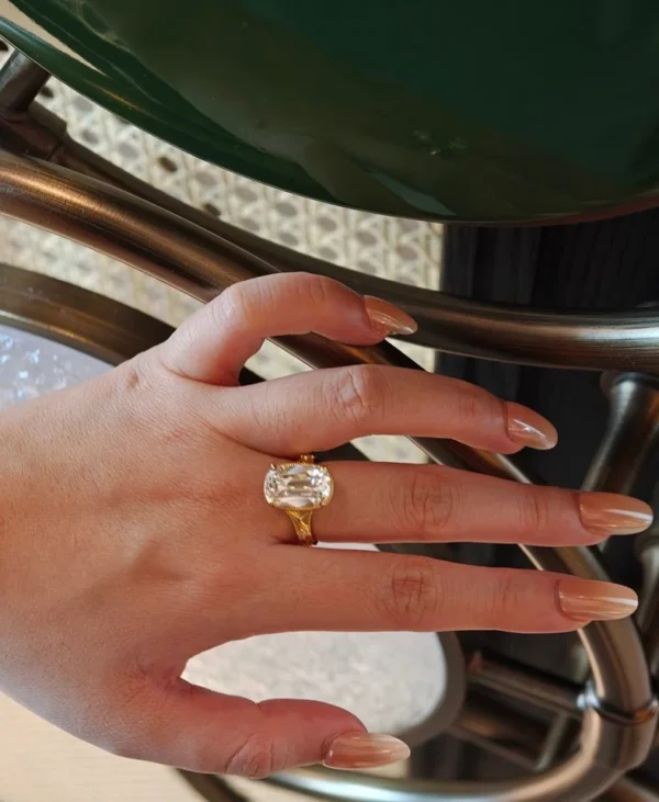 Additional product photograph showing the ring design, setting and band.