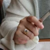 Additional product photograph showing the ring design, setting and band.
