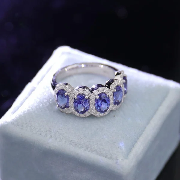 Additional product photograph showing the ring design, setting and band.