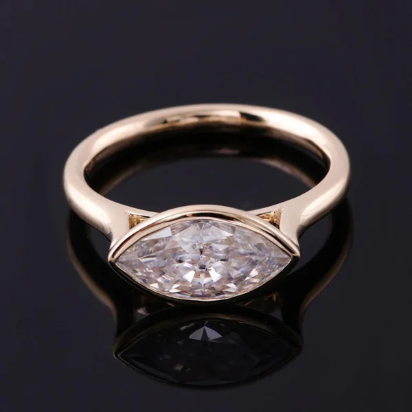 Additional product photograph showing the ring design, setting and band.
