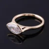 Additional product photograph showing the ring design, setting and band.