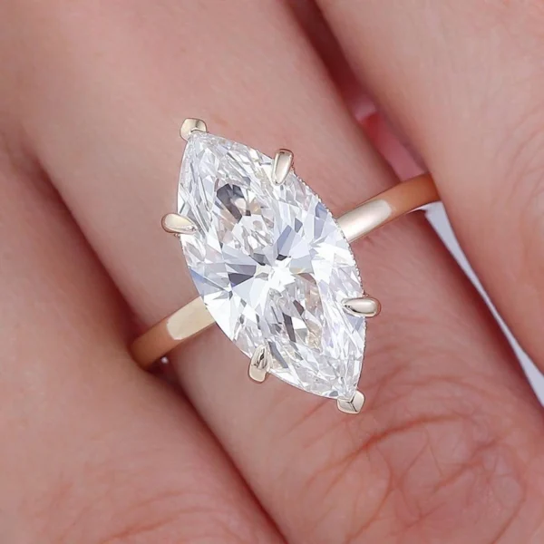 Additional product photograph showing the ring design, setting and band.
