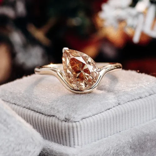 Product photograph showing the pear solitaire ring.