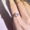 Additional product photograph showing the ring design, setting and band.