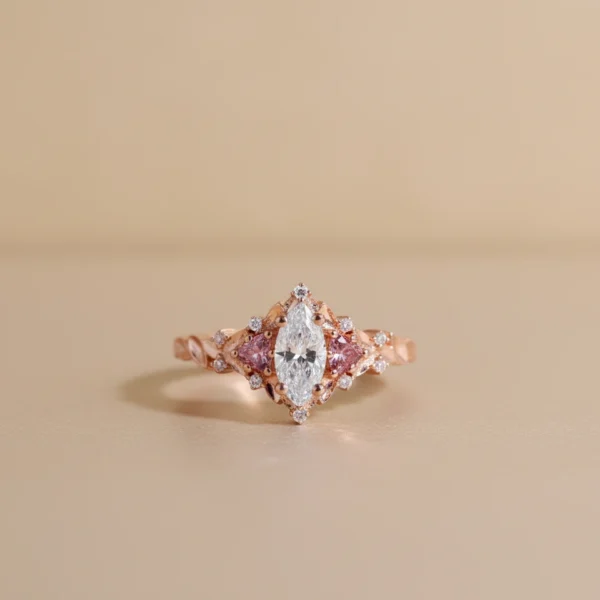 Product photograph showing the marquise side-stone ring.