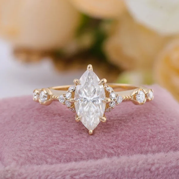 Jewelry design reference showing the ring setting and band. Marquise Moissanite Side-Stone Ring Design.