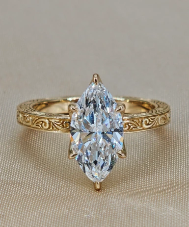 Additional product photograph showing the ring design, setting and band.
