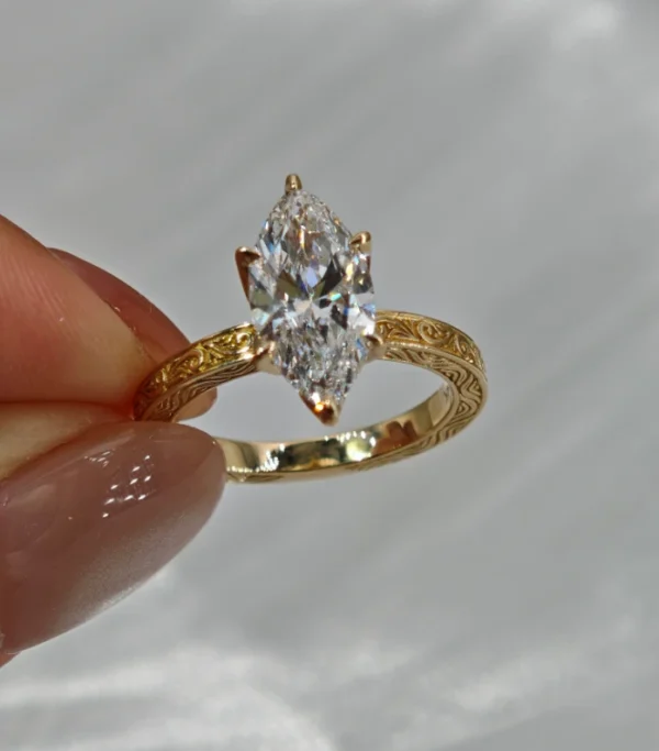 Marquise Moissanite Ring in Gold shown in the product photograph.