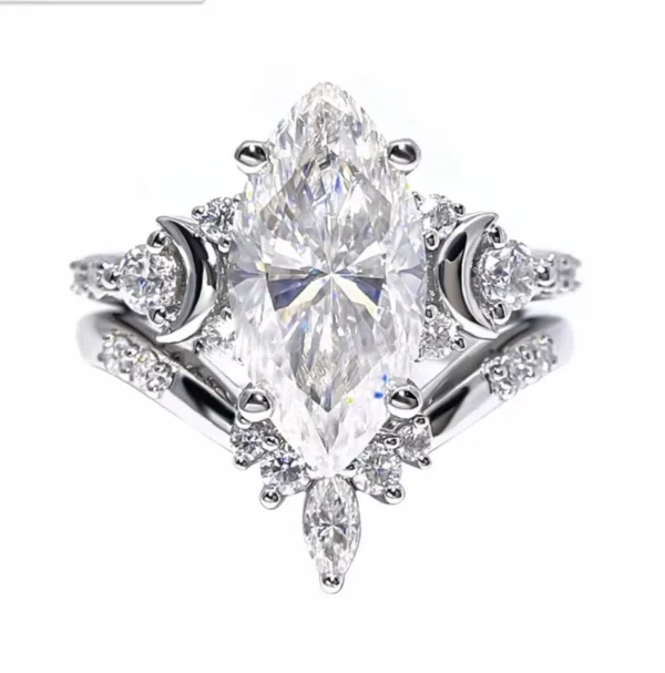 Product photograph showing the marquise side-stone ring.