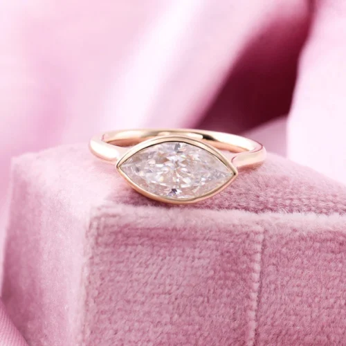 Marquise Moissanite Solitaire Ring in 10K Gold shown in the product photograph.