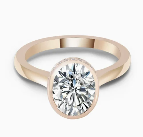 Moissanite Bezel-Set Ring in Gold shown in the product photograph.