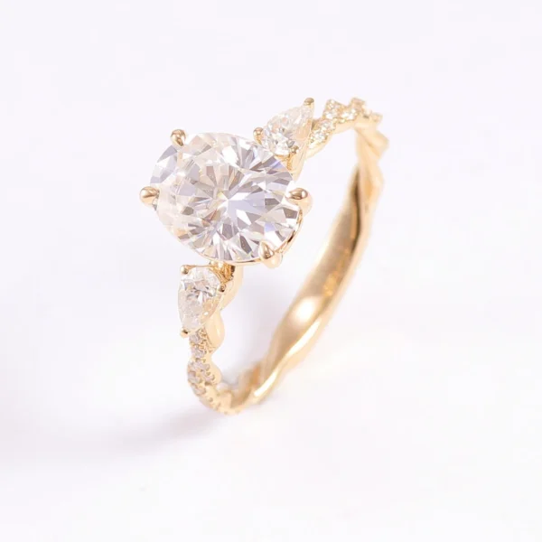 Jewelry design reference showing the ring setting and band. Oval Side-Stone Ring Design in 10K Gold.