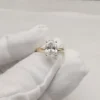 Additional product photograph showing the ring design, setting and band.