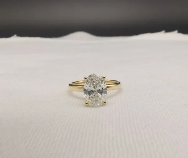 Oval Gemstone Ring in Gold shown in the product photograph.