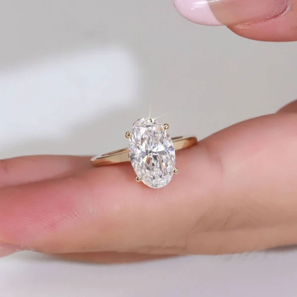 Additional product photograph showing the ring design, setting and band.