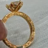 Additional product photograph showing the ring design, setting and band.