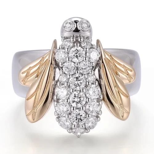 Product photograph showing the stone-set insect ring.